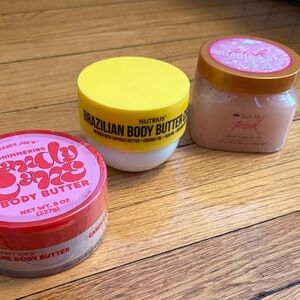 lot of 3 body care essentials - tree hut scrub, nutrius body butter, trader joes